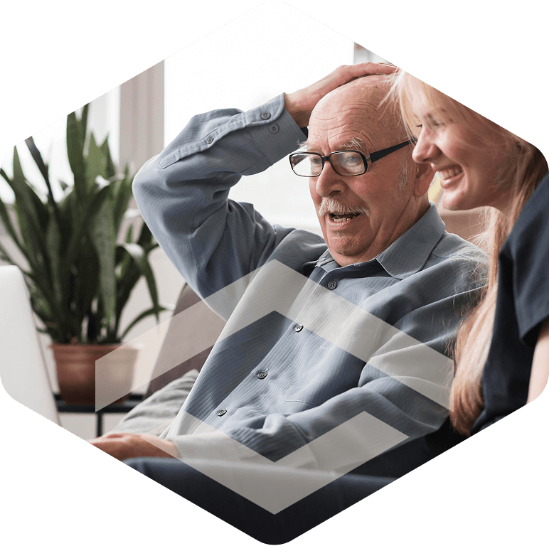 Caregiver supporting a memory care resident