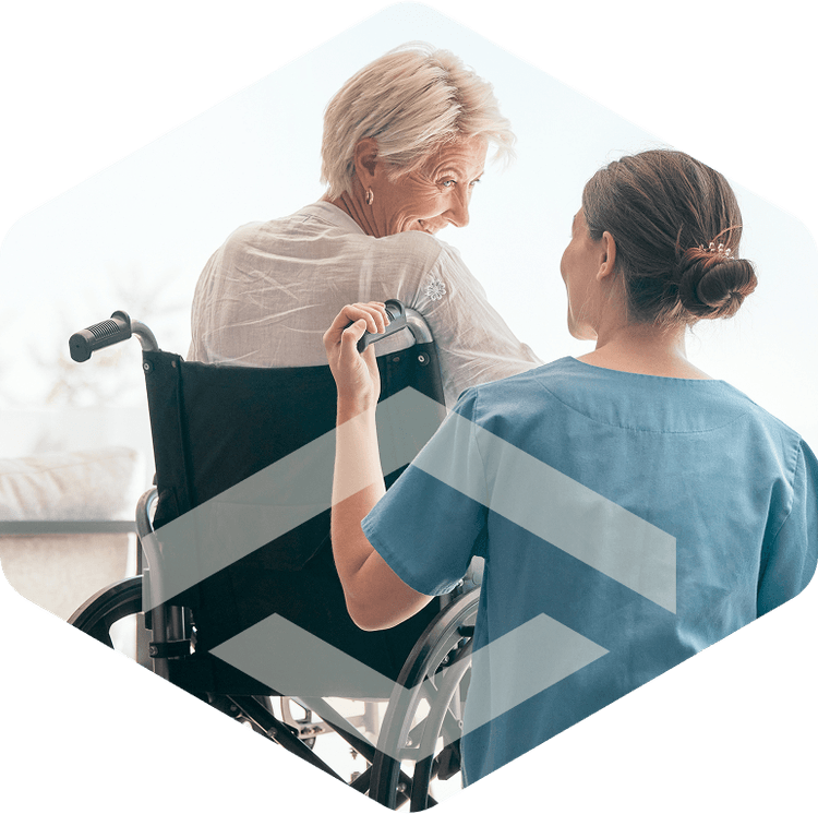 Therapist working with a patient in a wheelchair